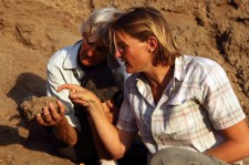 Meave (L) and Louise Leakey, discussing one of the new fossils at the time of discovery. Found within a radius of just over 10 km from 1470’s location, the three new fossils are dated between 1.78 million and 1.95 million years old.