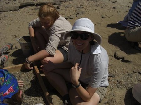 Katie and Abby continue the search for tiny bone fragments.