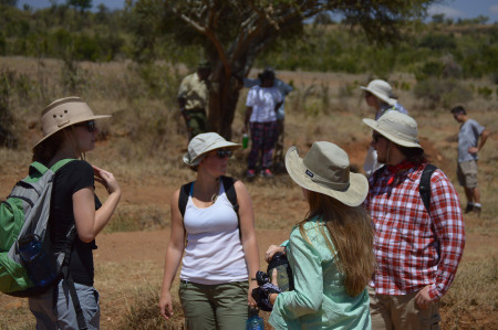Meg, Meredith, Laura, and Tristan take a break on a hike to a small hill called Mu Kenya. 