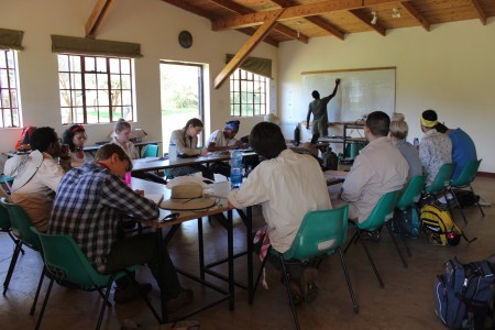The students learn about methodologies for studying vegetation ecology from Mr. Kimani Ndung’u in the classroom at Mpala Research Center (Photo by Martha N. Mutiso).