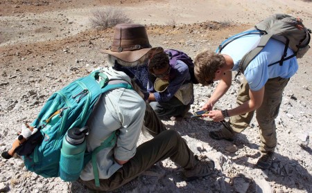 Kait, Rob and Niguss take carefully positioned GPS points to map the Chari tuff area.