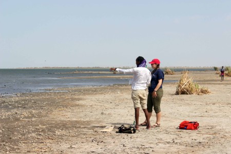 Yemane and Jen strategize which trajectory to perform their shoreline elevation transect.