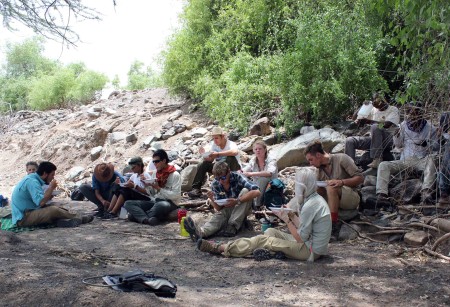 Students take a well deserved break in the shade for a picnic lunch in the Kokiselei riverbed.