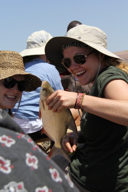 Natalie and Ingrid hold the first catch of the day