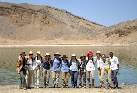 Students pose for a group photo down by Flamingo Lake.