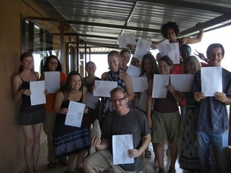 The talented group poses with their drawings, with Ned, Most Accurate winner, front and center.