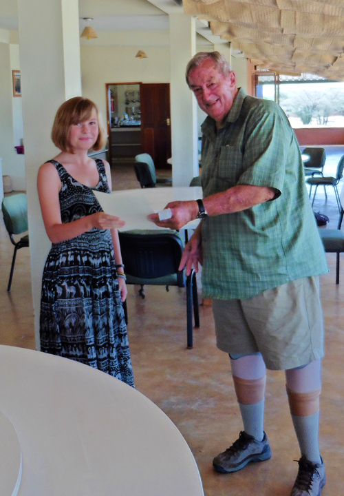 Lucy being congratulated by Dr Leakey