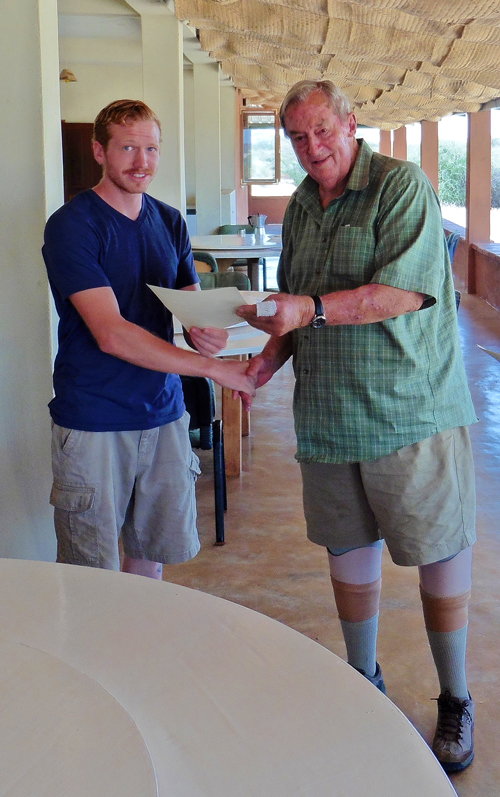 Ned being congratulated by Dr Leakey