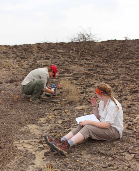 Jen and Maddie practice their fossil finding and recording skills.