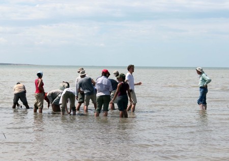 TBI students try their hands at taking sediment cores from the lake bottom with TBI field school director Linda Martin and Dr. Bob Raynolds.