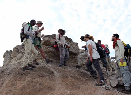 Prof. Feibel shows the students the Chari tuff. 