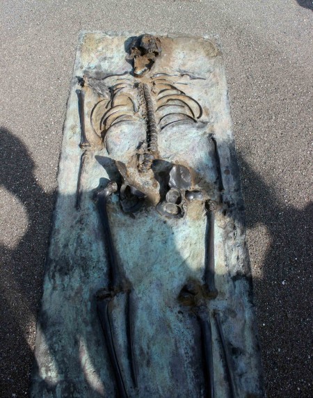 The monument is complete with a metal cast of the skeleton in its original position when it was found.